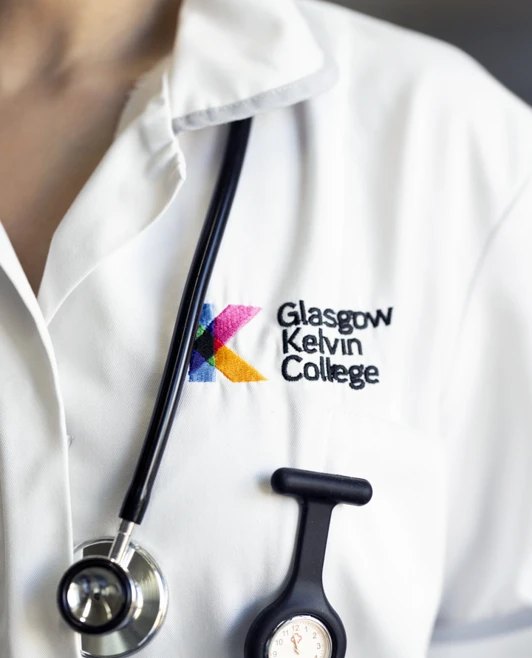 Close-up of a Glasgow Kelvin College care student uniform with stethoscope and fob watch. Close-up of a Glasgow Kelvin College care student uniform with stethoscope and fob watch.